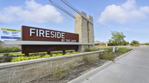 Entrance of the community with massive sign at Fireside by the Lake in Garland, Texas