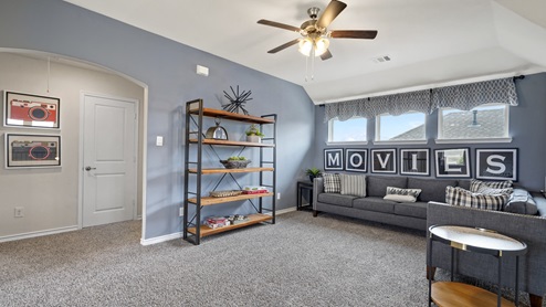 large upstairs media room with movie themed decorations