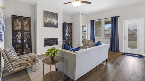 living room with couch and other furniture with window
