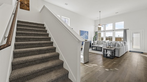 entry view of stairs and living area