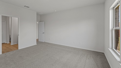 large Primary bedroom with window