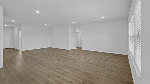 large living area with views to entry and hallways
