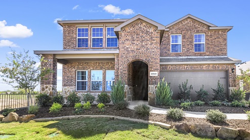 a brick home in riverfield community