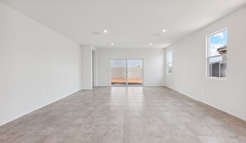 blackstone great room with sliding glass door to the backyard