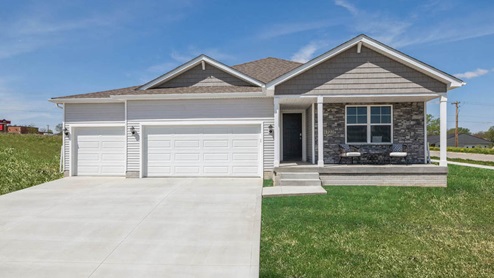 Neuville ranch home exterior with three car garage