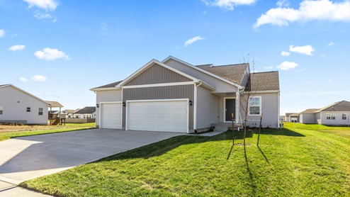 Bryant split level home exterior with spacious yard