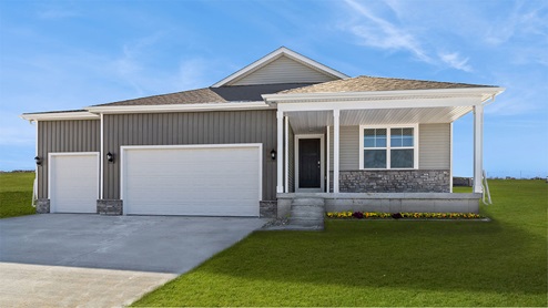 exterior of ranch style home with three car garage