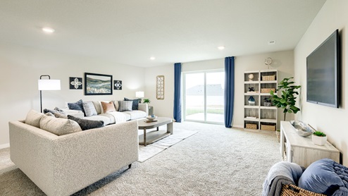 Basement of the Hamilton with large white sofa