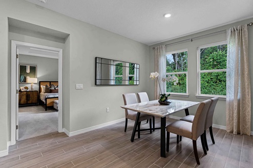 Dining room with access to master bedroom.