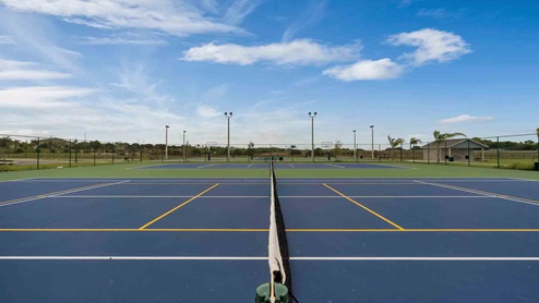 Outdoor tennis court amenity.