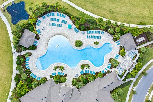 Arial view of community pool and clubhouse.