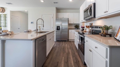 Spacious kitchen with stainless steel appliances