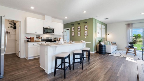 Spacious kitchen with views to liv room and dining room