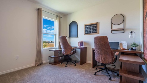 Office with desk, 2 chairs and a cabinet
