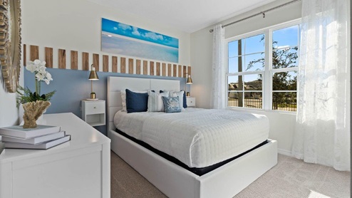 Guest bedroom with bed and dresser