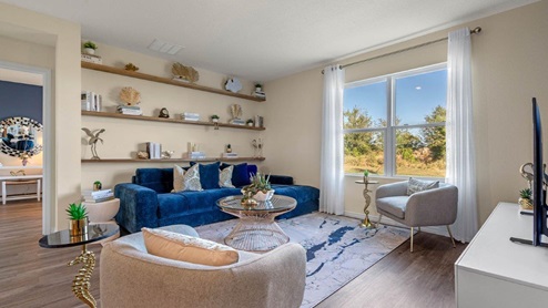 living room with couch and chairs