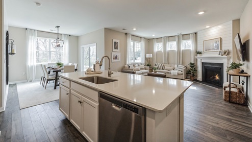 white kitchen with white kitchen island