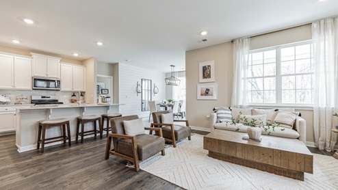 white kitchen with white kitchen island