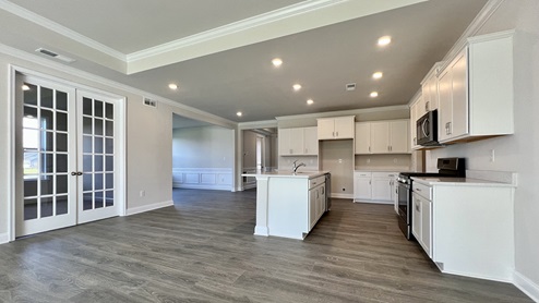 Open concept kitchen and living area.