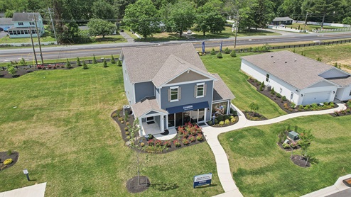 The Magnolia Estates two-story Pine and one-story Cali model homes.