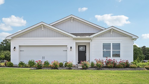 The Cali model home with cream siding.