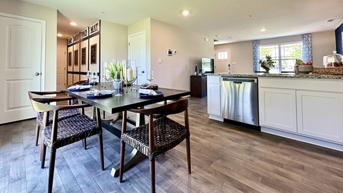 The kitchen is large enough for a dining room table.