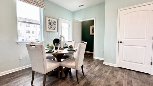 A powder room is off the dining area.