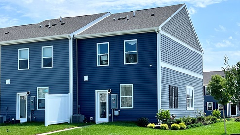 The back of the exterior end unit townhome.