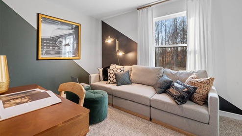 secondary bedroom staged as rec room