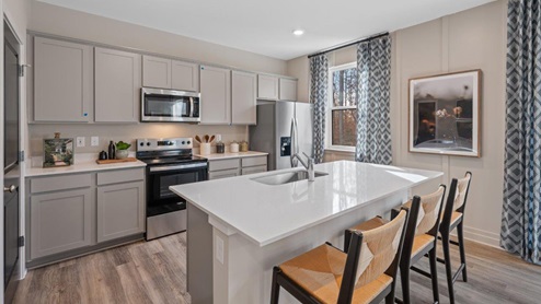 stainless steel appliances and shaker cabinets