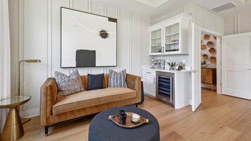 master bedroom sitting area with coffee bar