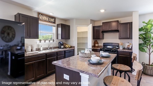 D.R. Horton san antonio solana ridge near lackland air force base the swift 1625 square feet kitchen with brown cabinets and kitchen island