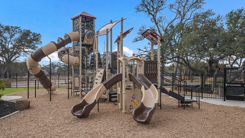 Bulverde Texas DR Horton Homes Copper Canyon New Construction Homes outdoor playground sets with slides jungle gym towers climbing rock and monkey bars