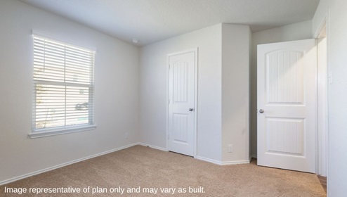 DR Horton San Antonio Laurel Vistas the garland floorplan 1151 square feet secondary bedroom with carpet flooring, large windows and closet