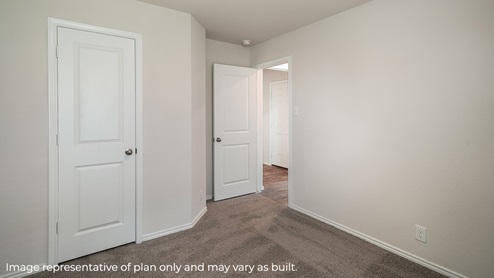 DR Horton San Antonio Laurel Vistas the carswell floor plan 1180 square feet secondary bedroom or bonus room with carpet flooring and closet