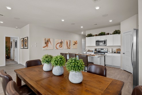 Rockbridge Model Home open-concept dining area with view to kitchen.