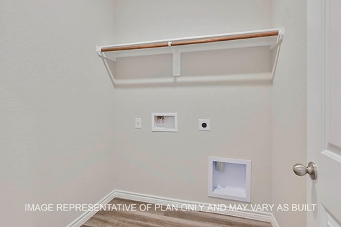 Sonoma utility room with vinyl plank flooring.