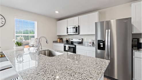 Granite countertops and stainless steel appliances