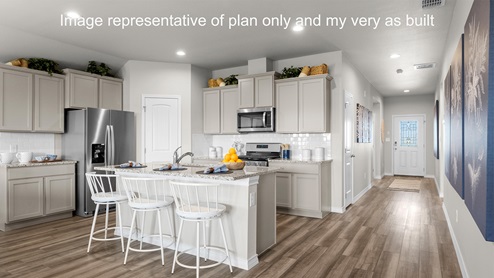 Staged Texas Cali wit island kitchen with breakfast bar