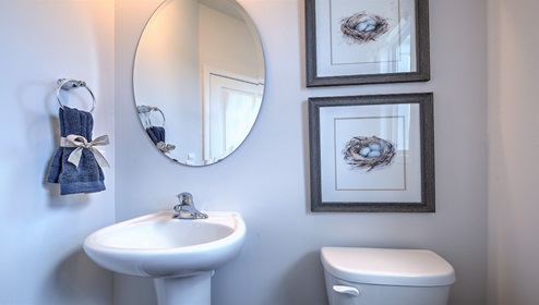 Powder bathroom with sink and toilet