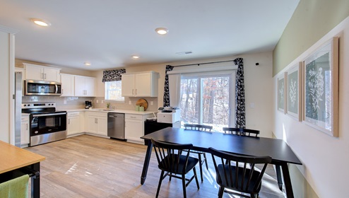 Kitchen and breakfast are with sliding glass door windows