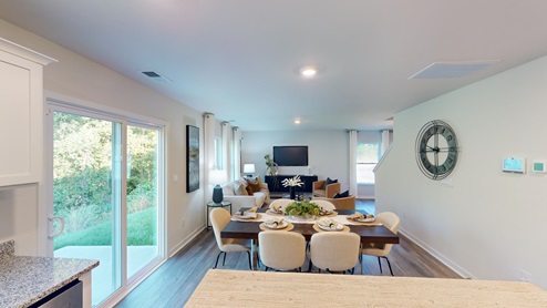 Kitchen and dining area with sliding glass back door