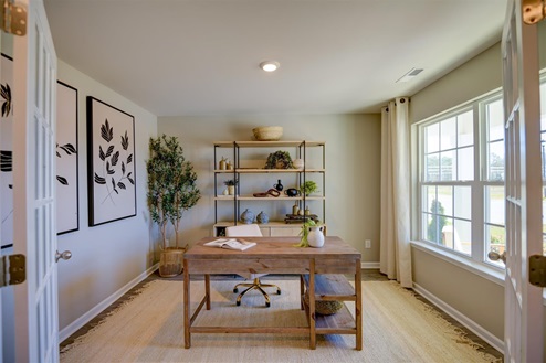 Office with vinyl floors and French doors