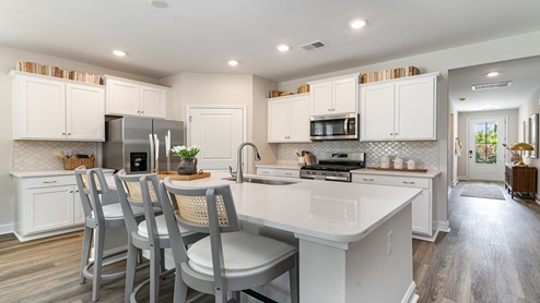 Darby kitchen with white cabinets and granite countertops