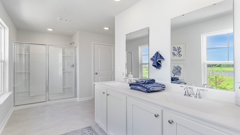 primary bathroom with walk in shower