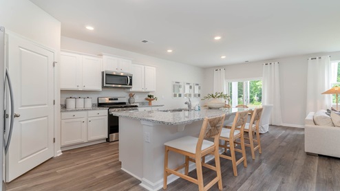 kitchen with white cabinets