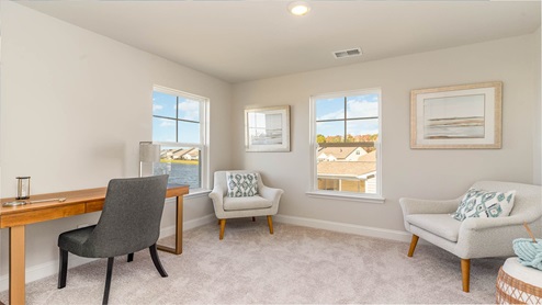 upstairs bedroom with carpet