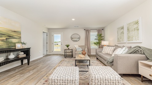 Devon living room with rugs and coffee table