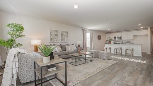 Devon living room with view of kitchen