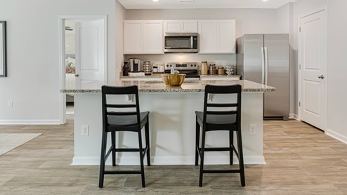 Our homes feature open floorplans that combine style and functionality. You'll find sleek granite countertops, islands, and shaker-style cabinets in the kitchen. For that modern touch, you'll also get stainless-steel appliances, dishwasher, and microwave. Smart home technology is included, providing convenience and efficiency at your fingertips. Jacksonville, North Carolina is a thriving Military town with plenty of southern charm. Home to Marine Corps Base Camp Lejeune and a vibrant coastal community. This bustling city offers a perfect blend of military heritage, outdoor recreation, and family-friendly attractions. With public access to Onslow Beach and North Topsail Beach, you are sure to get your fix of sun! If the ocean isn’t your thing, come and shop at Jacksonville Mall, or explore the natural beauty of Hammocks Beach State Park nearby. With a growing population and strong economic outlook, Jacksonville is an ideal destination for military families, young professionals, and retirees alike.
